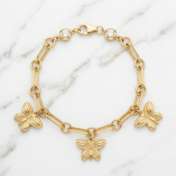 Pulsera Eslabón Rolo con 9 Charms Colgantes y Corazón Pavé en Oro Amarillo 10K - 6.42g