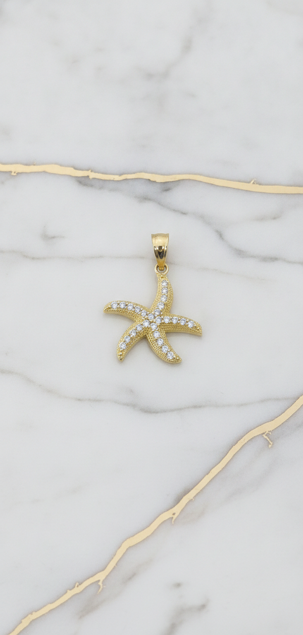 Dije Estrella de Mar con Zirconias en Oro Amarillo 10K (0.94g)