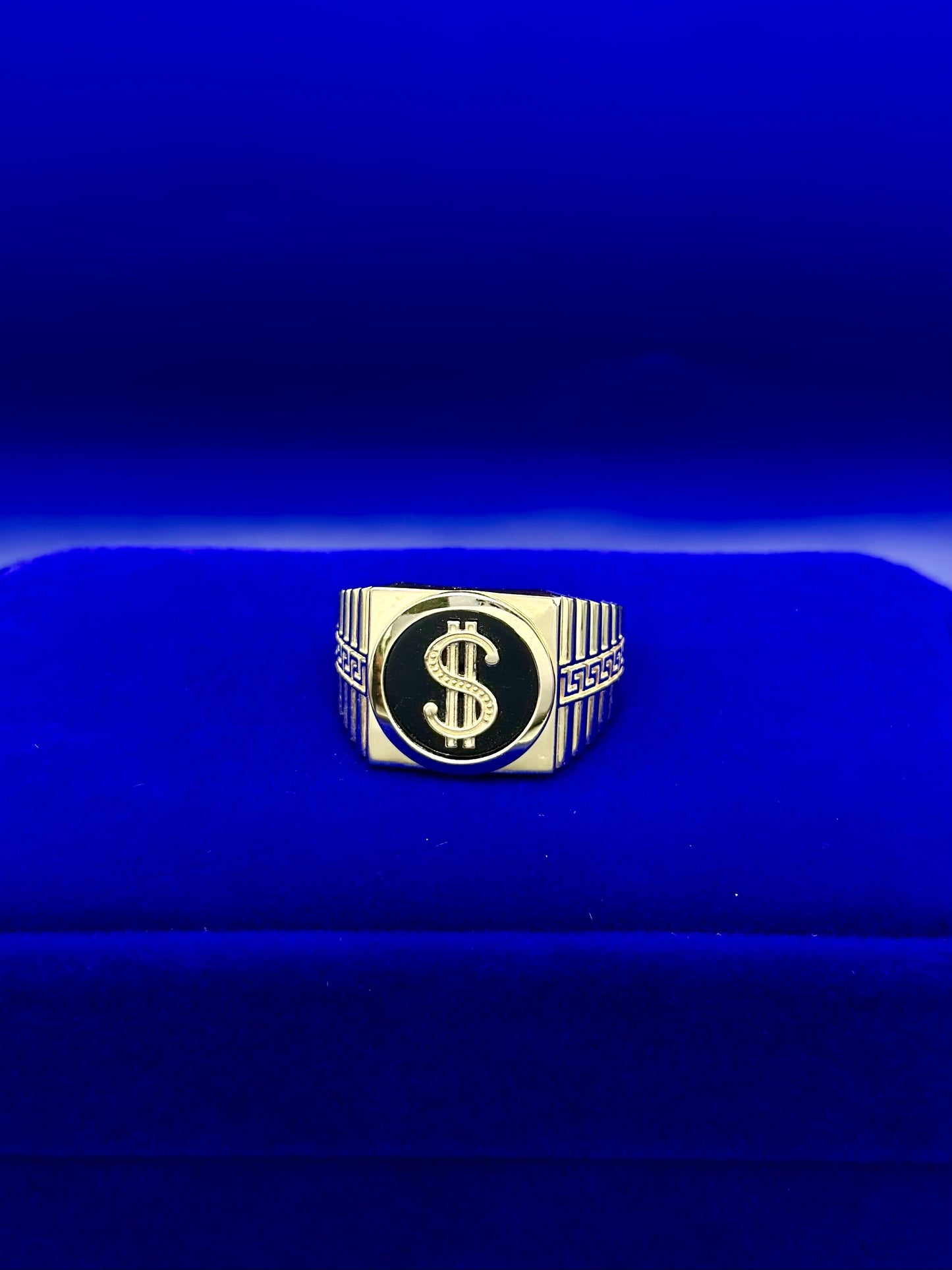 Dollar sign ring