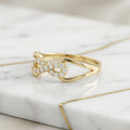 Anillo Infinito con Piedras Blancas en Oro Amarillo 10K - 1.60g