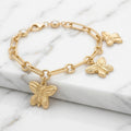 Pulsera Eslabón Rolo con 9 Charms Colgantes y Corazón Pavé en Oro Amarillo 10K - 6.42g