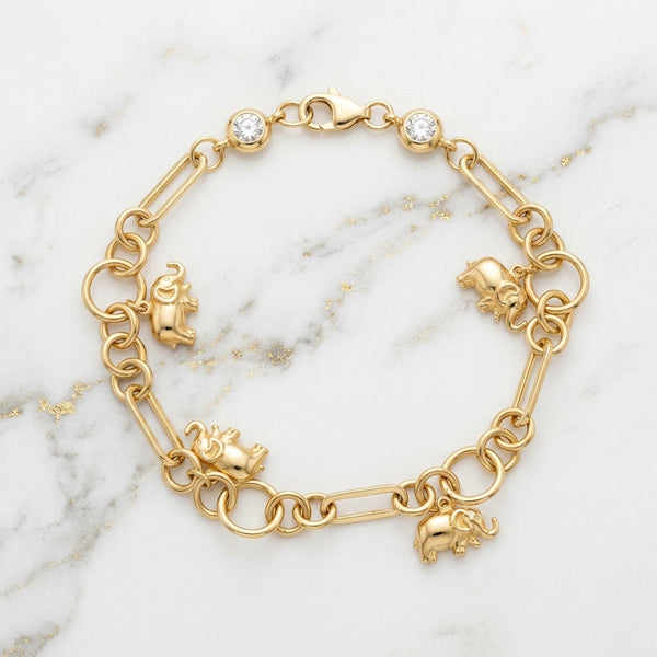 Pulsera Eslabón Paperclip con 4 Dijes de Elefante y Biseles en Oro Amarillo 10K - 5.14g