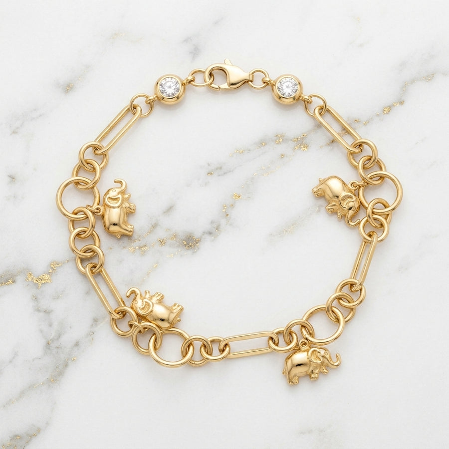 Pulsera Eslabón Paperclip con 4 Dijes de Elefante y Biseles en Oro Amarillo 10K - 5.14g