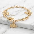 Pulsera Eslabón Paperclip con 4 Dijes de Elefante y Biseles en Oro Amarillo 10K - 5.14g