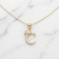 Dije Letra Inicial C con Corona y Zirconias en Oro Sólido Amarillo 10K (0.82g)