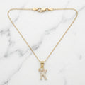 Dije Letra Inicial K con Corona y Zirconias en Oro Sólido Amarillo 10K (0.92g)