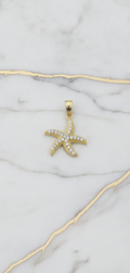 Dije Estrella de Mar con Zirconias en Oro Amarillo 10K (0.94g)