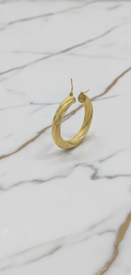 Aretes Argollas Torcidas Nevadas Grandes con Textura Diamantada en Oro Amarillo 10K - 6.25g