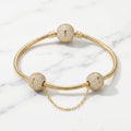 Pulsera Tejido Serpiente Estilo Pandora con Esfera Pavé y Cadena de Seguridad en Oro 10K (8") - 10.31g