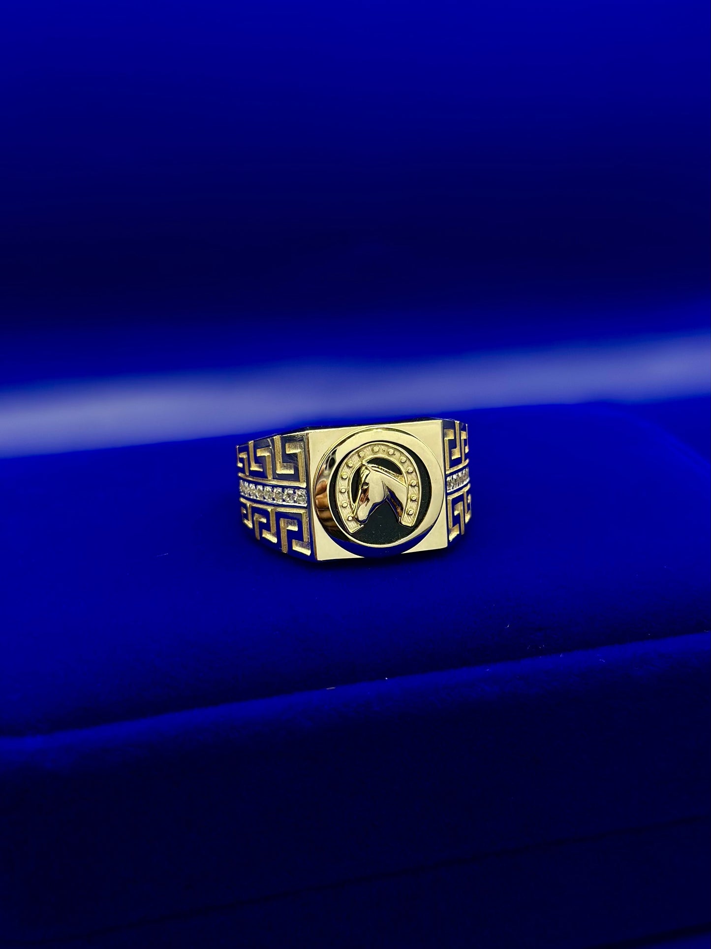 Golden horseshoe and colt ring