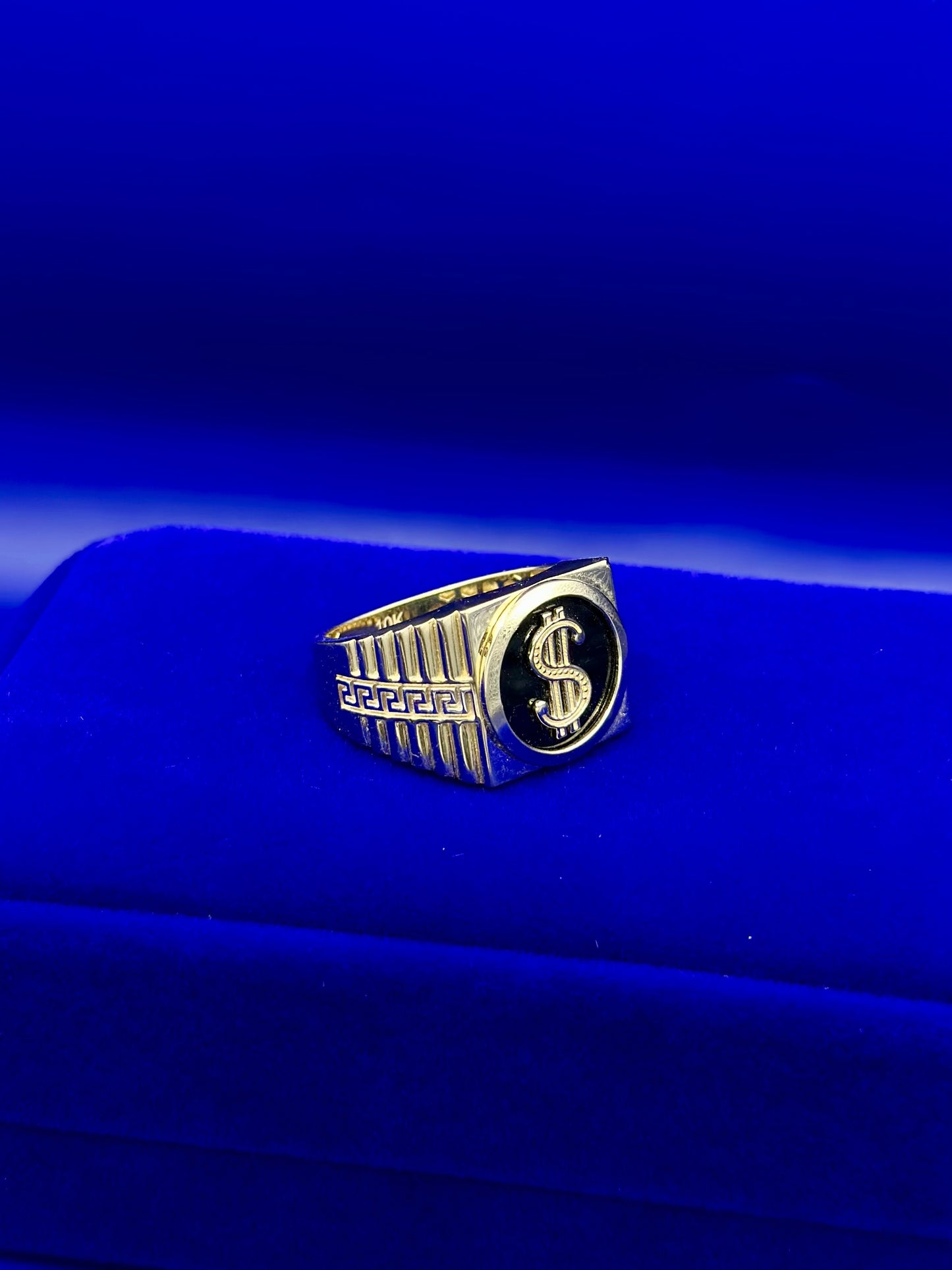Dollar sign ring