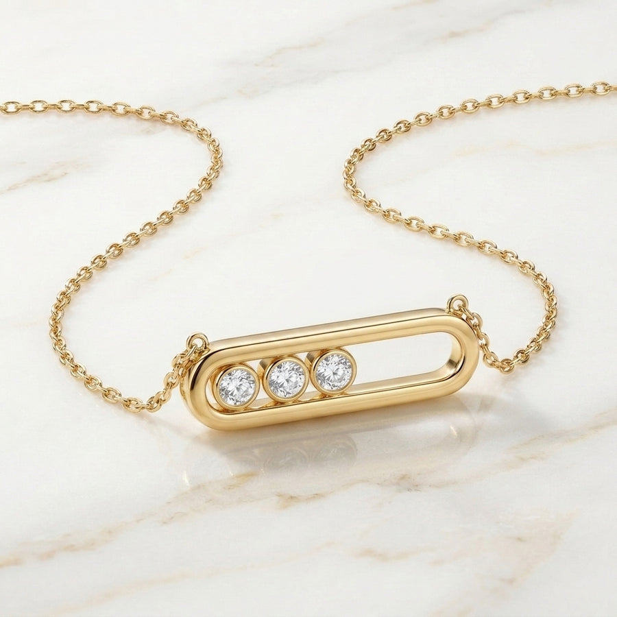 Collar con Dije Ovalado Liso y 3 Piedras Móviles en Oro 10K (4.44g)