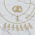 Combo Exclusivo: Aretes Argollas Torcidas Lisas Talla 1 + Cadena Fina Eslabón 20" + Dije Inicial con Corona en Oro 10K (3 Prendas)
