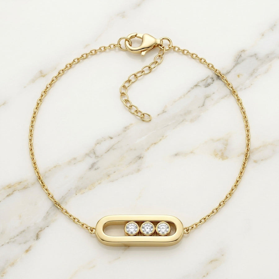 Pulsera con Dije Ovalado Liso y 3 Piedras Móviles en Oro 10K (3.03g)