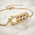 Pulsera con Dije Ovalado Pavé y 3 Piedras Móviles en Oro 10K (2.97g)