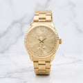 Reloj Invicta Cuarzo Dorado para Hombre — Esfera Champagne con Segundero y Números 12-3-6-9 (De Pila / No Oro) - 1435